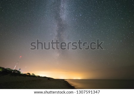 Milky Way over the sea shoreline.