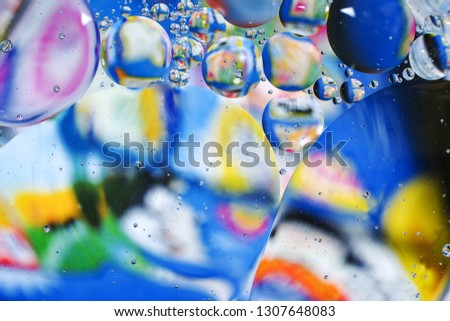 colorful background from water drops and oil
