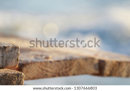 wooden board at the seacoast, summer background,photo