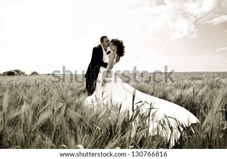 Wedding picture of European couple with red haired bride.