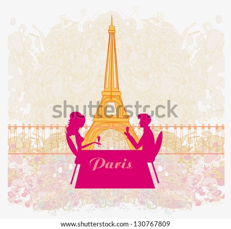  Young couple flirt and drink champagne in Paris