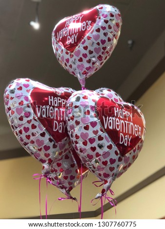 Close up view of happy valentine's day balloons on display