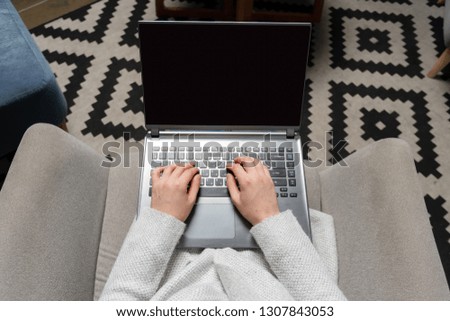 High angle above top view and cropped photo of lady person in stylish trendy wear. She sitting inside room and using portable pc
