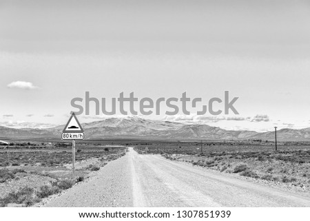A landscape on road R356 to Ceres in the Western Cape Province. Snow is visible on Matroosberg. Monochrome
