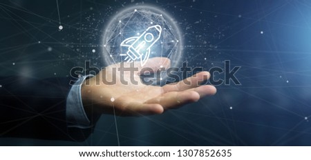 View of a Businessman holding a  start up rocket on a sphere 3d rendering