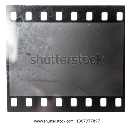 grungy 35mm filmstrip or frame on white