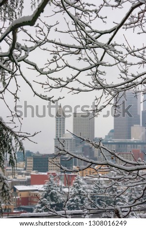 Downtown Seattle covered in snow on a cloudy winter day