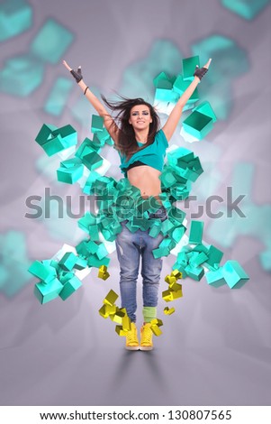 young woman dancer in the Y pose, welcoming you to the dance floor, on a 3d cubes colorful background