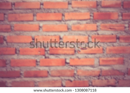 Burred facade view of old brick wall background,Background of old vintage brick wall 
