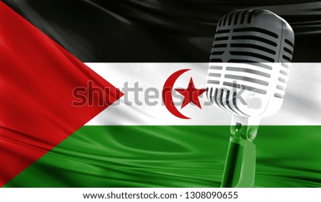 Microphone on fabric background of flag of Western Sahara close-up