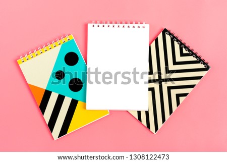 set of notebooks for notes  on pink background Place for text Flat lay Top view Goals,Means, Resolution concept