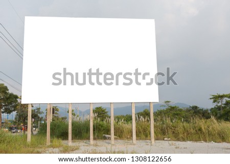 Blank billboard outdoor advertising near the road with sky background