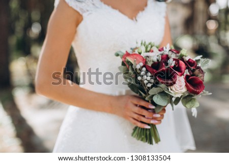 wedding bouquet in the hands of the bride, live flowers, wedding, luxury