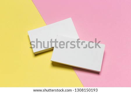 Business cards Mockup on two color background. pink and yellow background