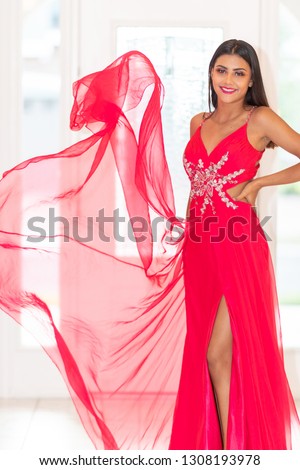 Young hispanic teen girl going to a prom dance