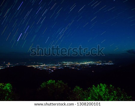 Star Trail with mountains and cityscape And Cities Lights  landscape photography
