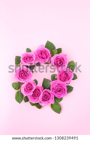 Pink roses on a gentle background. Bouquet as a gift. Card with flowers for the holiday. Free space for text