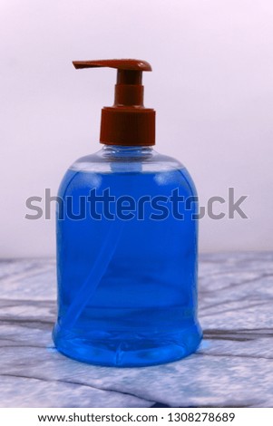 Dishwashing liquid detergent in plastic bottle isolated on white background. Green color dishwashing liquid .