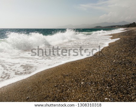 Wavy isolated beach at Preveza, Epirus Greece