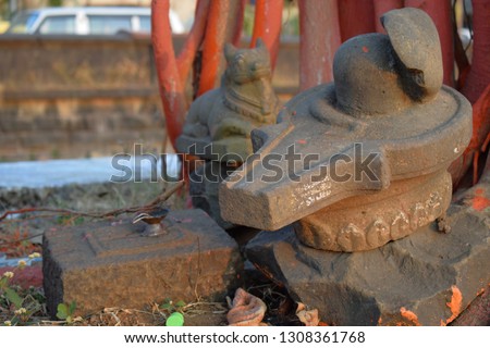 Picture of a ancient epic old shivalinga in the old city of India