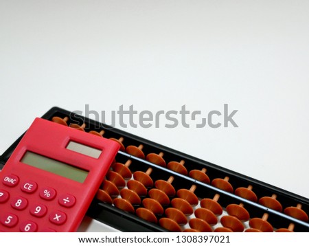 Red Calculator and  Abacus