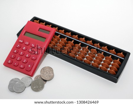 Abacus and Red calculator Japanese coins