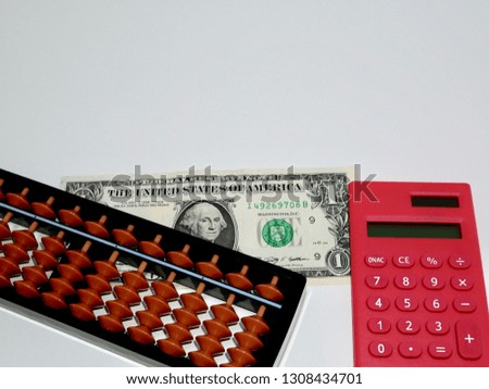 Abacus and Red calculator 1 dollar bill