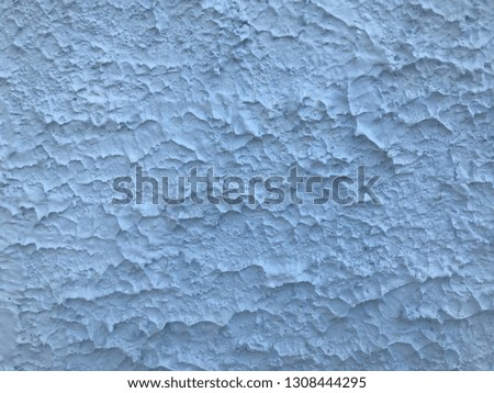 Blue rugged cement wall background