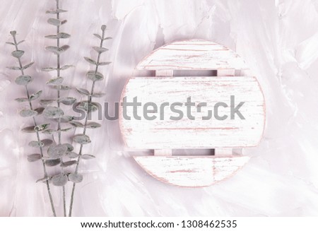 Styled stock photo background for Social Media, Branding and Blog. Flat lay image with gray cement background and eucalyptus
