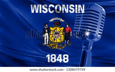 Microphone on fabric background of flag State of Wisconsin close-up