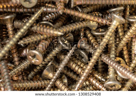 Macro photo of screws. Set of screws. Construction abstraction. Industrial background. Screws macro photo, screw background, steel screw, screw macro.