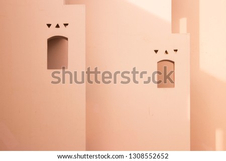 Minimalist pastel color wall  with window in Egypt. 
