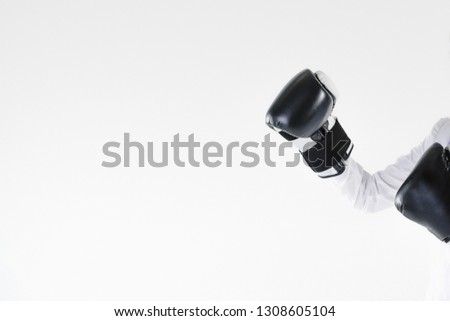 One pair gloves in front struggle office team work for equality gray background light right. Hands two. Position politician competitor client. Copy space.