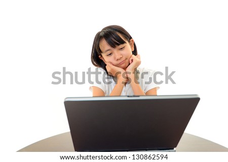 Bored girl sitting at her desk