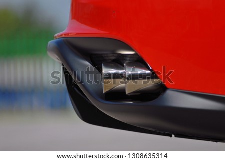 Exhaust pipe on a sports car