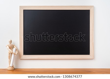 Design concept - Perspective view of blackboard and wood doll on white background  with teak floor for mockup