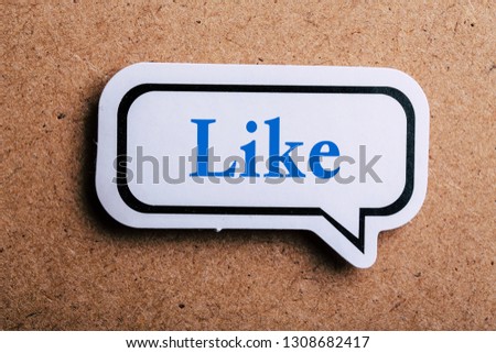 Like Concept speech bubble isolated on brown paper background with shadow.
