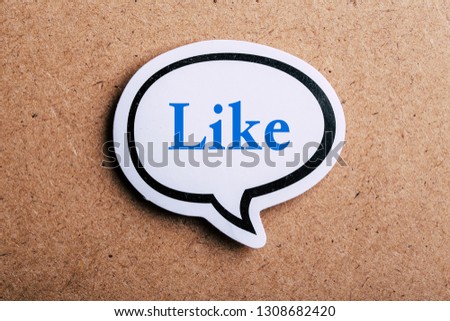 Like Concept speech bubble isolated on brown paper background with shadow.