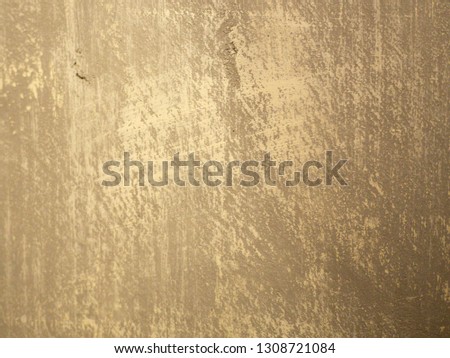 Texture of old yellow concrete wall for background.