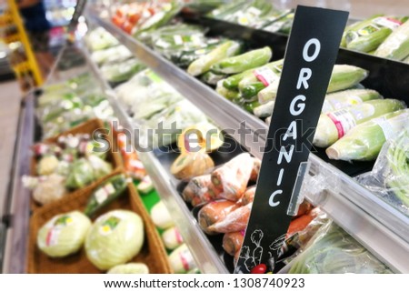 Organic signage at vegetable and fruits produce section of supermarket