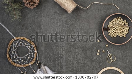 Preparation for the manufacture of a dream catcher. Flat lay, top view. Copy space. Home office desk