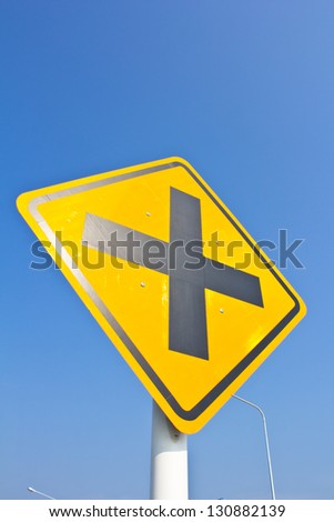 intersection sign in blue sky
