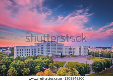 A typical main square of the post-Soviet regional center. Regional Executive Committee in Mogilev. City government building at sunset