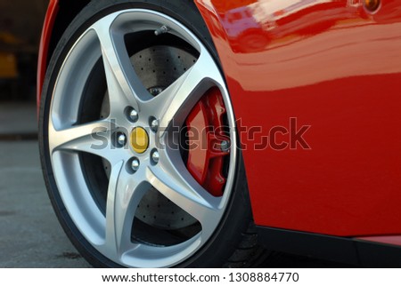 Wheel on a red sport car