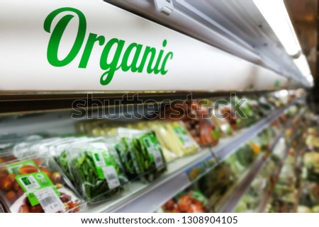 Organic signage at vegetable and fruits produce section of supermarket