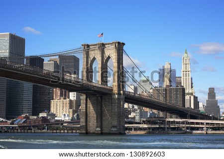 New York skyline showing Brooklyn Bridge Royalty-Free Stock Photo #130892603