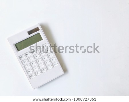 the white color calculator on white background