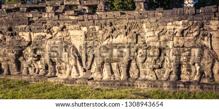 Bas-relief at Terrace of the Elephants at Angkor Thom temple complex. Siem Reap. Cambodia. Panorama