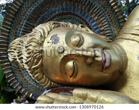 Close-up the face of Buddha image, temple in Thailand