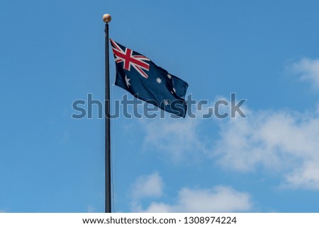 Australian flag with blue sky background